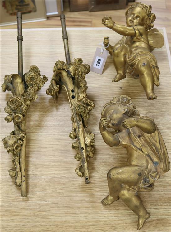 A pair of 19th century ormolu cherub and cornucopia wall mounts, height overall 50cm
